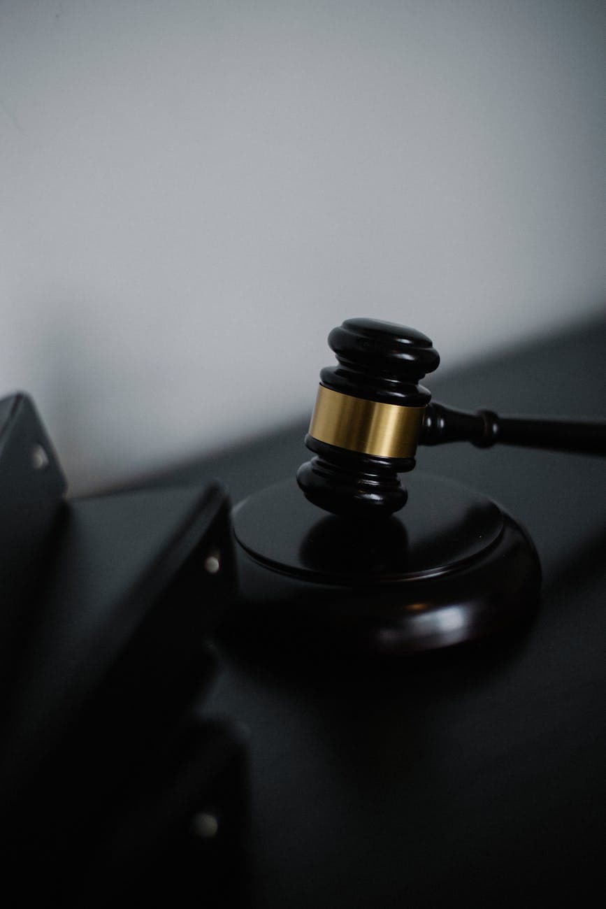 Gavel resting on legal documents, illustrating HIPAA enforcement actions and Civil Monetary Penalties for payment processing breaches.