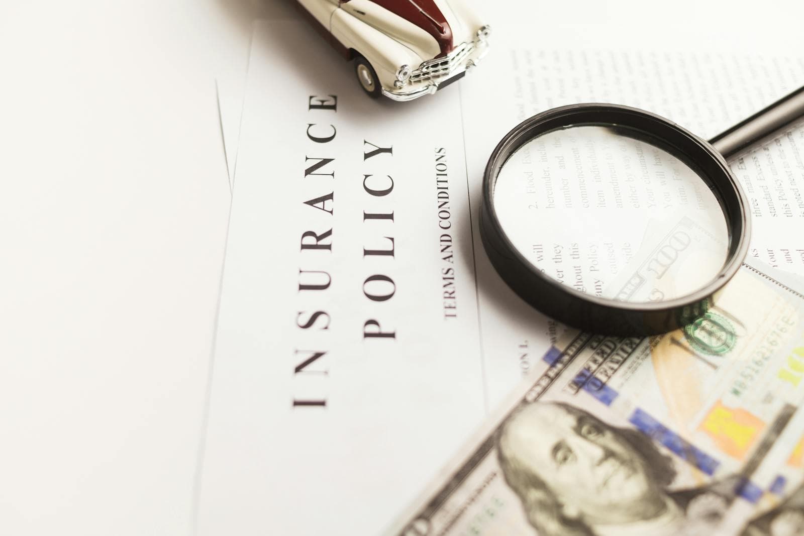 Insurance claims documents on a desk during review