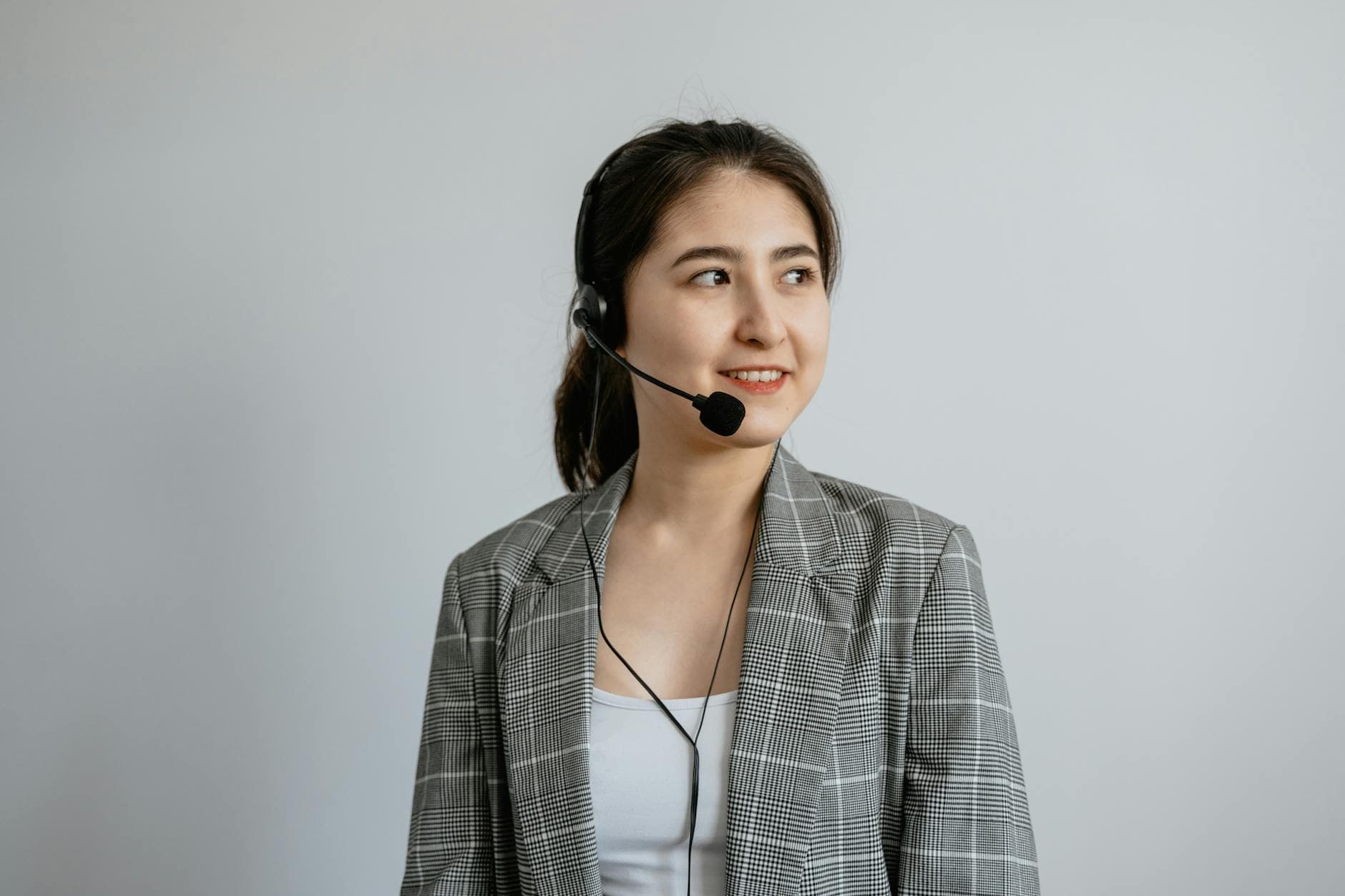 Contact centre agent wearing a headset handling a customer payment call