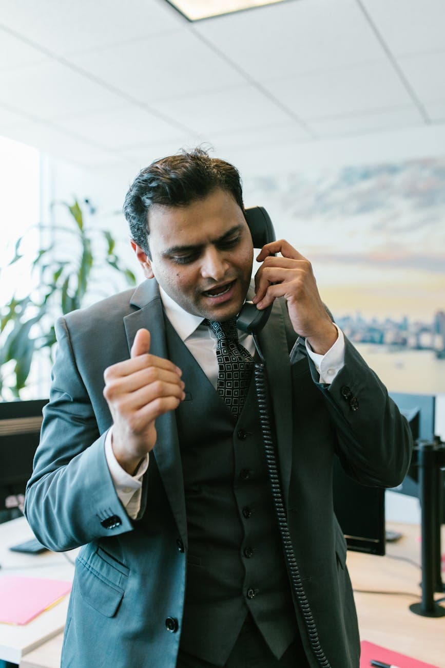 Professional reviewing TCPA consent records on a laptop