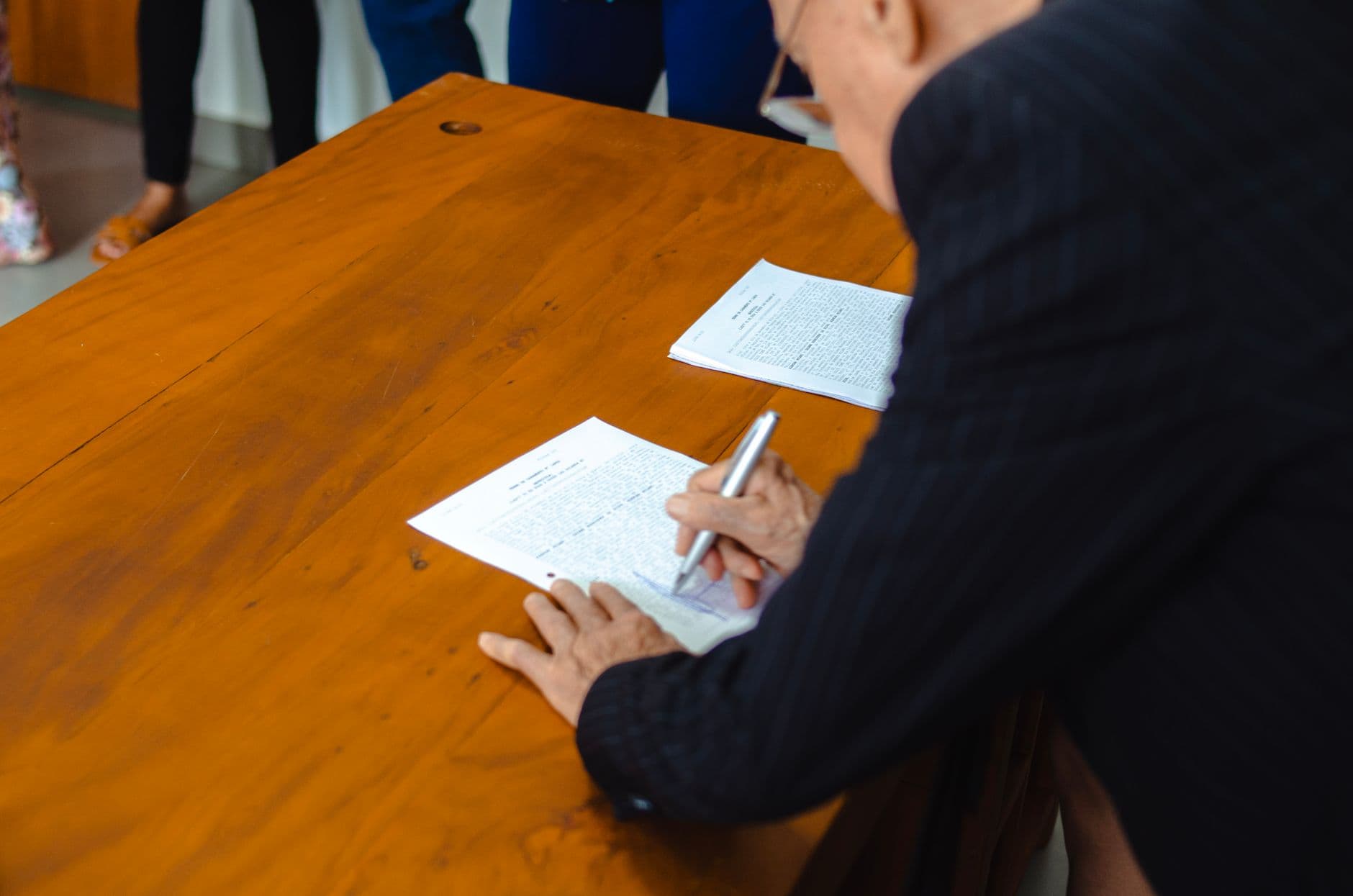 Professional reviewing TCPA consent records on a laptop