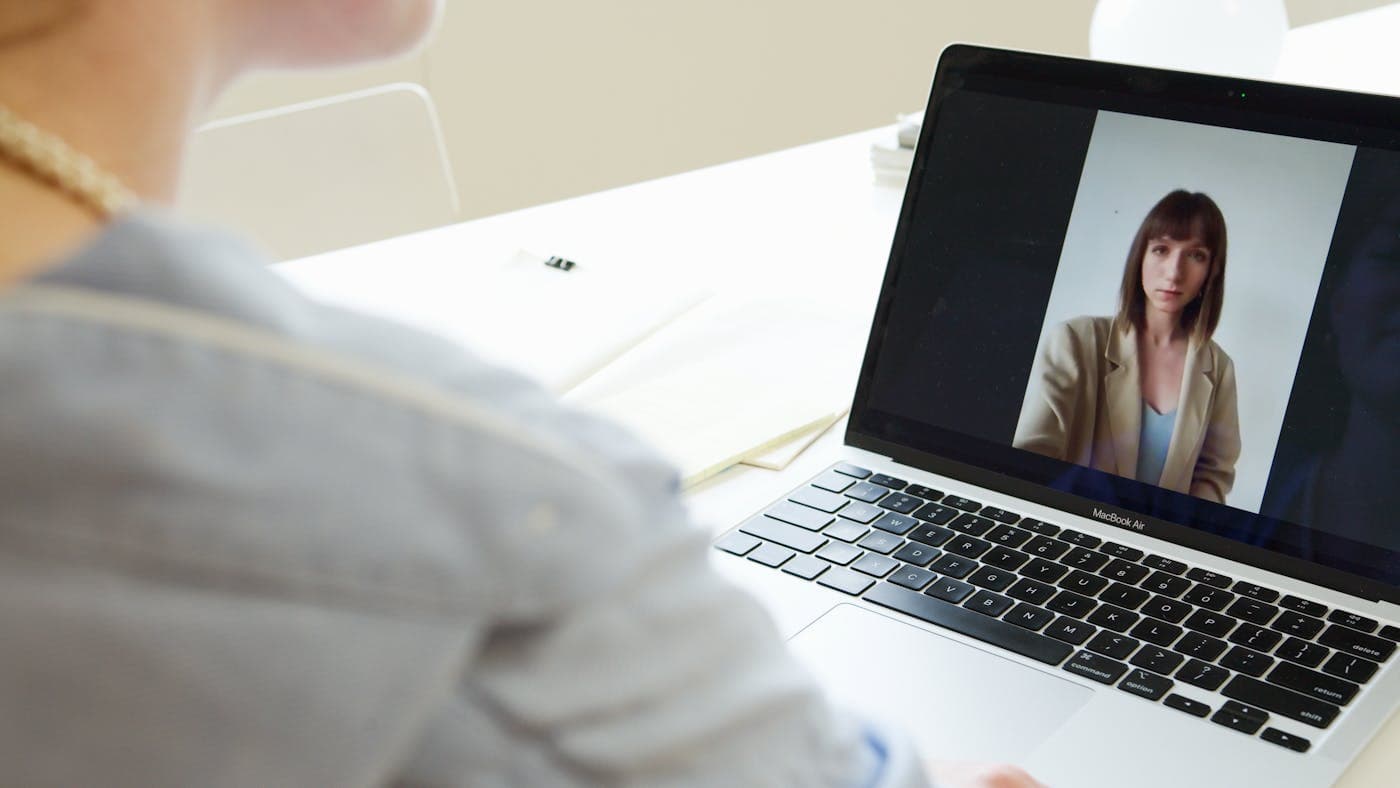 Person on a video call taking a payment through chat