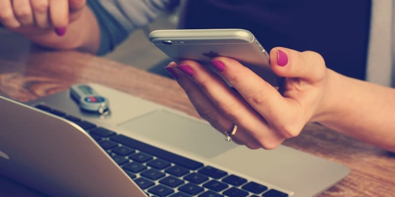 Healthcare professional handling secure patient phone payments