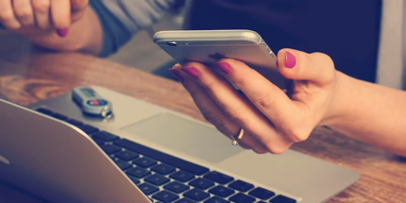 Healthcare professional handling secure patient phone payments