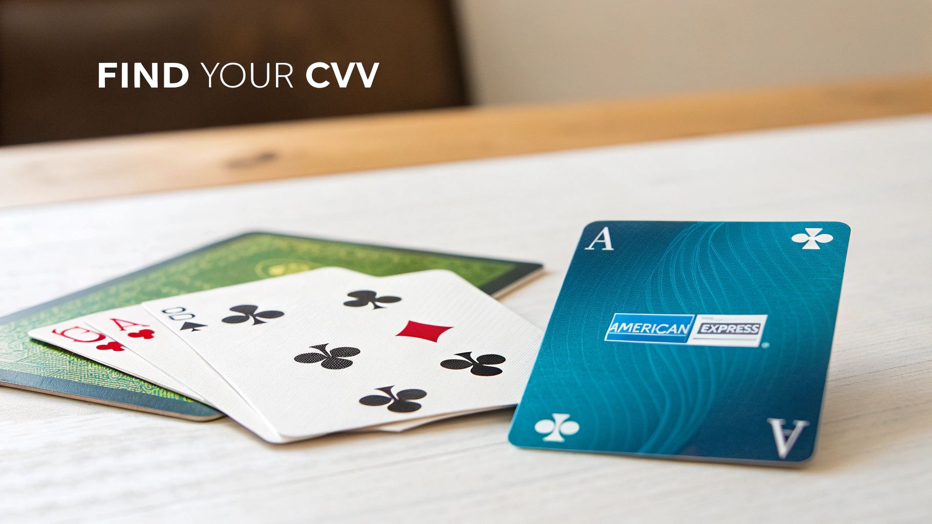 Close-up of playing cards on a table, including an American Express ace of clubs card, with 'FIND YOUR CVV' text.