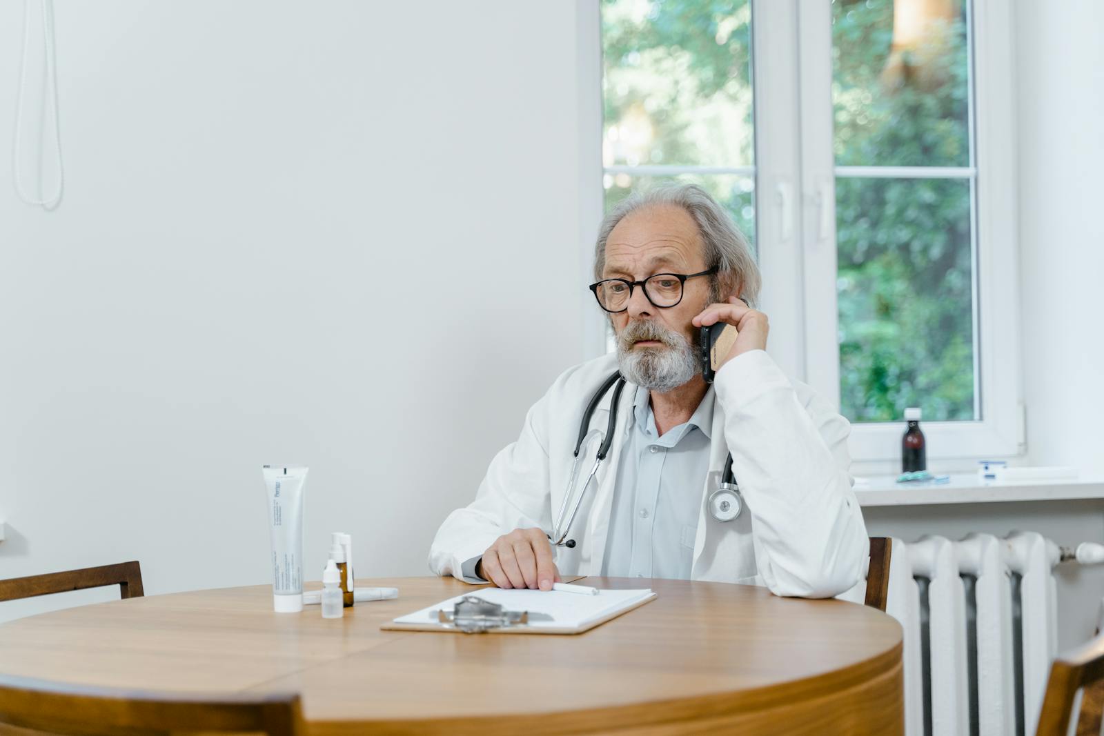 Person making a private payment call from a public waiting area on a mobile phone