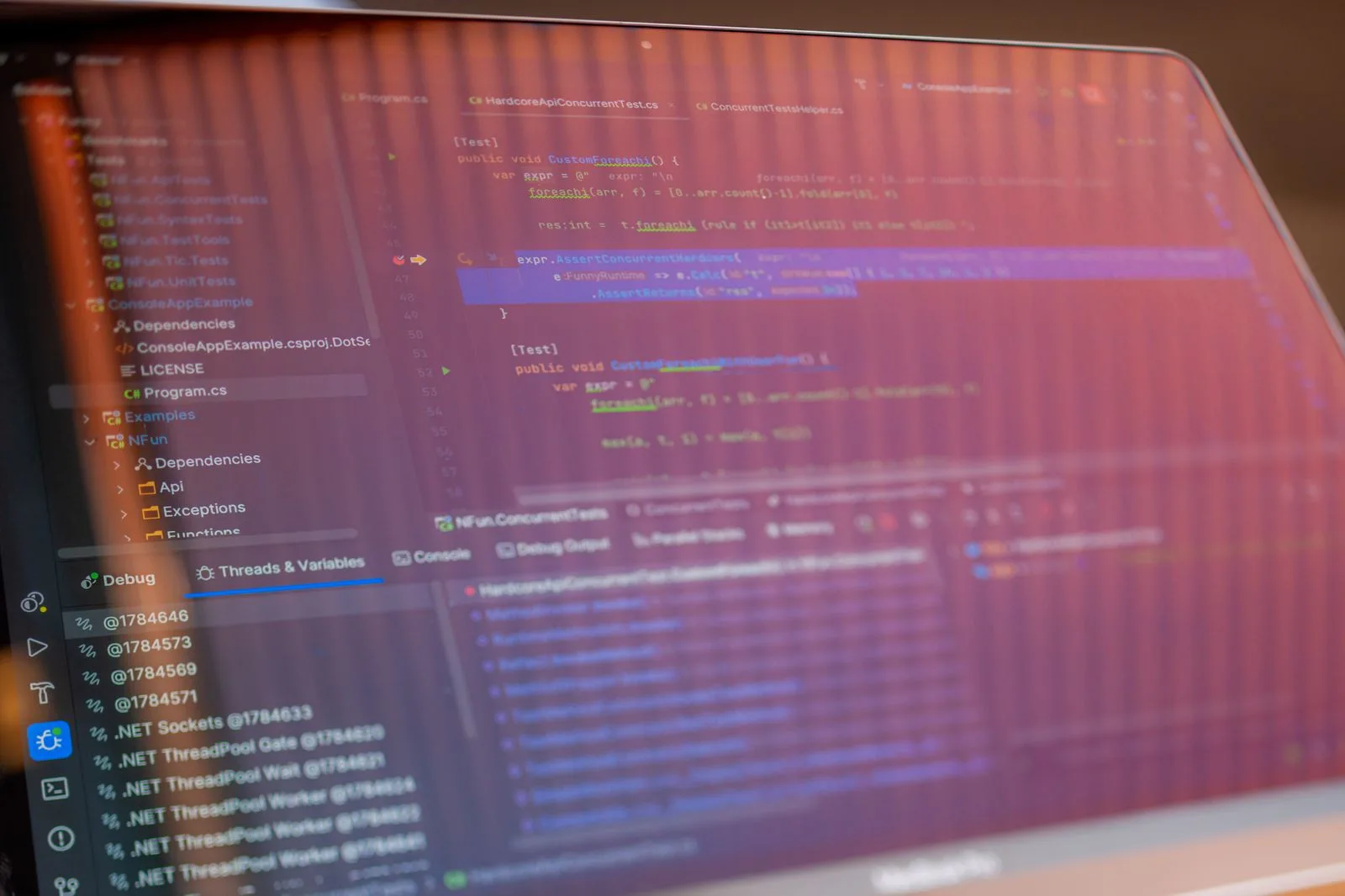 Close-up of JavaScript code on a developer screen representing payment page script integrity monitoring
